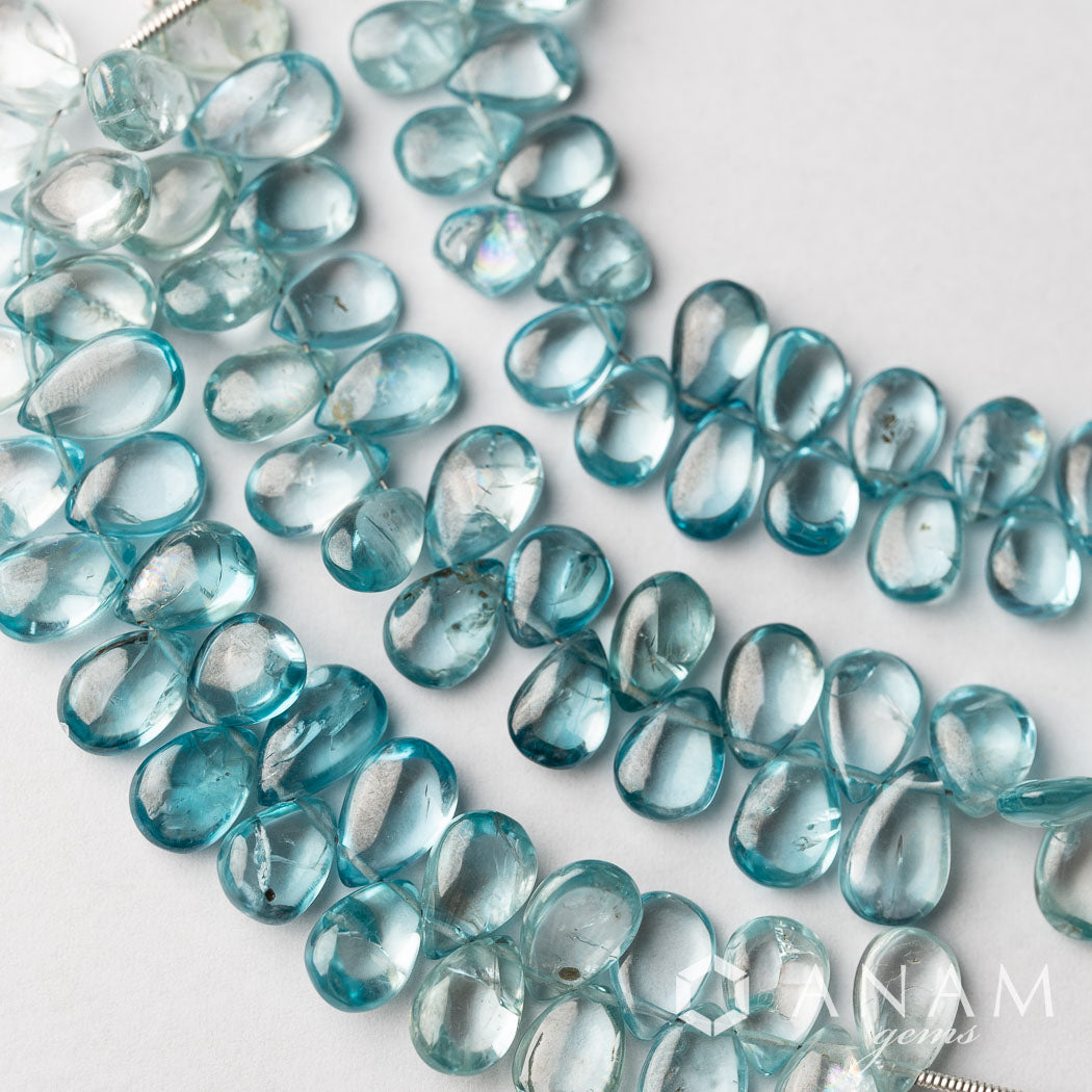 【ジャイプール仕入れ】ブルージルコン スムースペア|しっとりと深い輝きの宝石質ビーズ