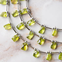 ペリドット レクタングルカット フェイス穴