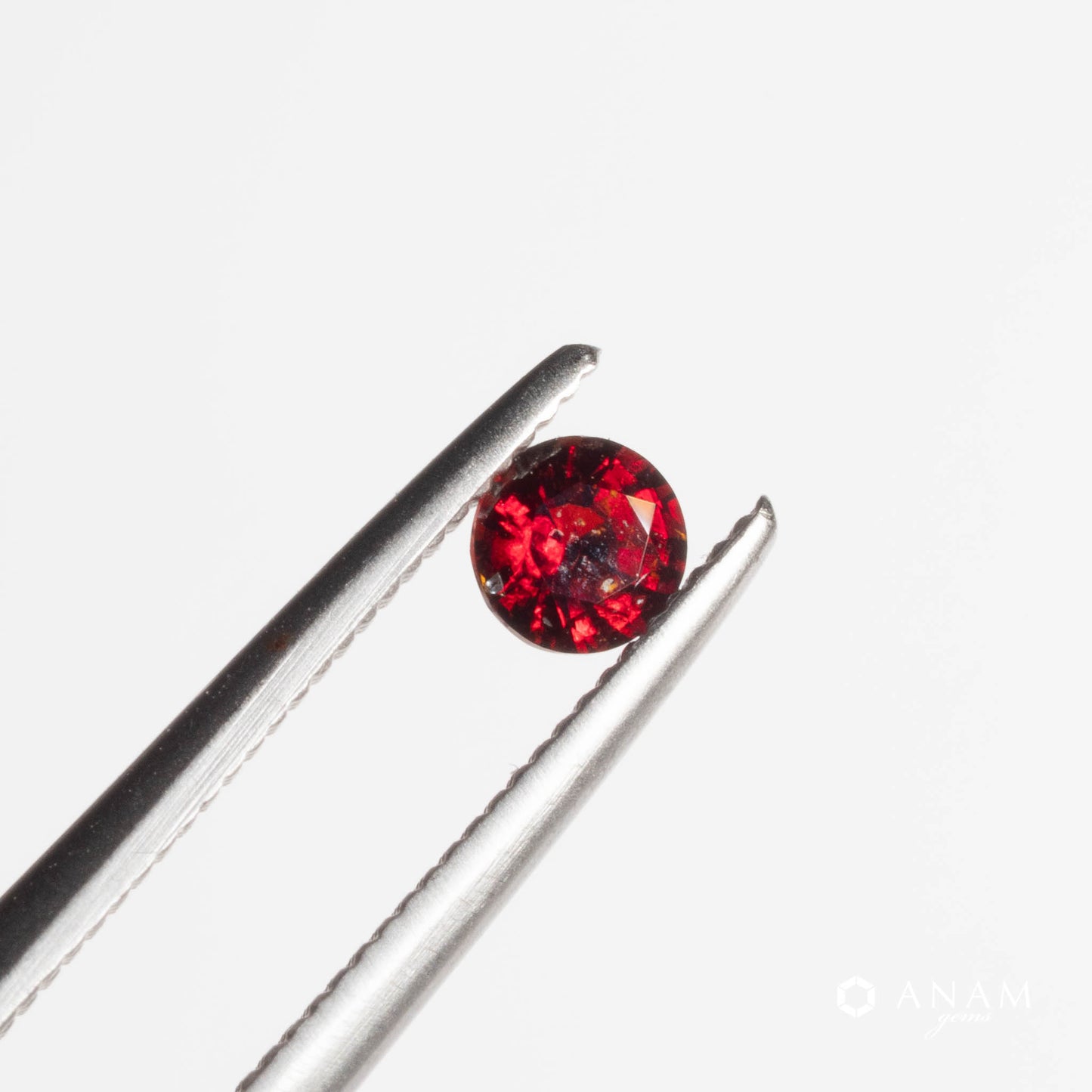 【バダフシャン州産】クリノヒューマイト（Clinohumite）0.14ct 3.2mm RD
