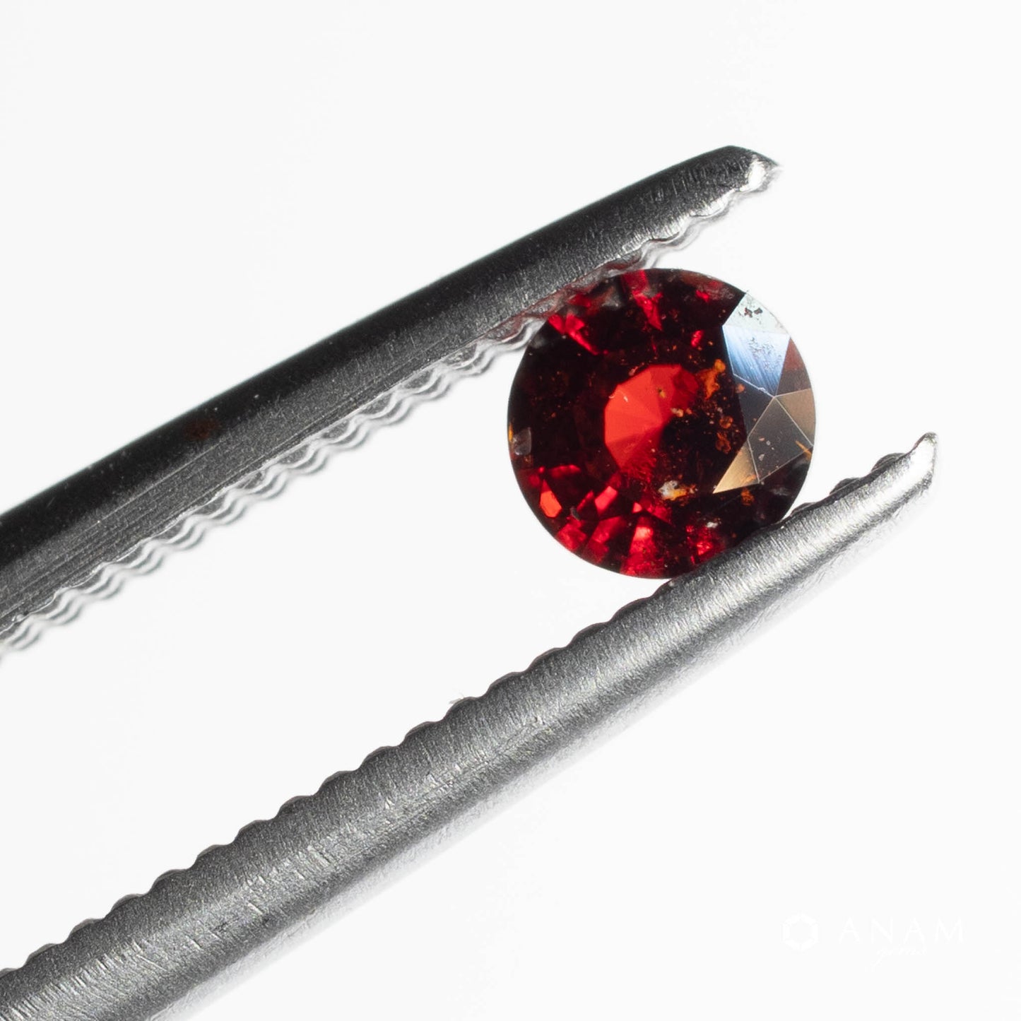 【バダフシャン州産】クリノヒューマイト（Clinohumite）0.14ct 3.2mm RD