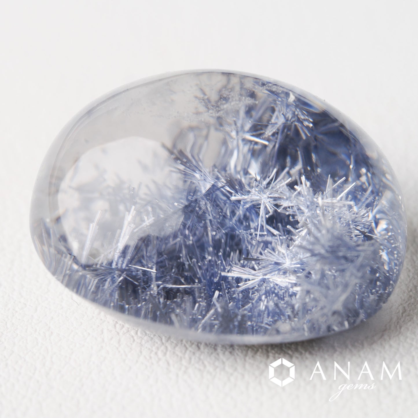 デュモルチェライトインクォーツ ルース –透明感と針が美しいマスターピース